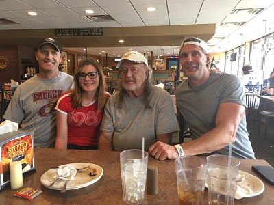 Photo of Bob with his three kids, Shane, Jason, and Karie